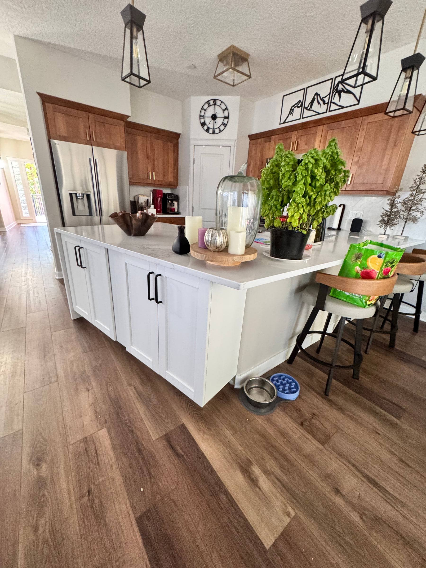 The kitchen island from the other end, showing the counter overhang for seating